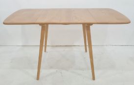 Light elm Ercol extending dining table and six Ercol stickback chairs (7)  Condition ReportTable has