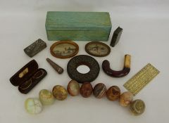 Carved onyx eggs, a parasol handle with gold-coloured collar, etc (2 boxes)