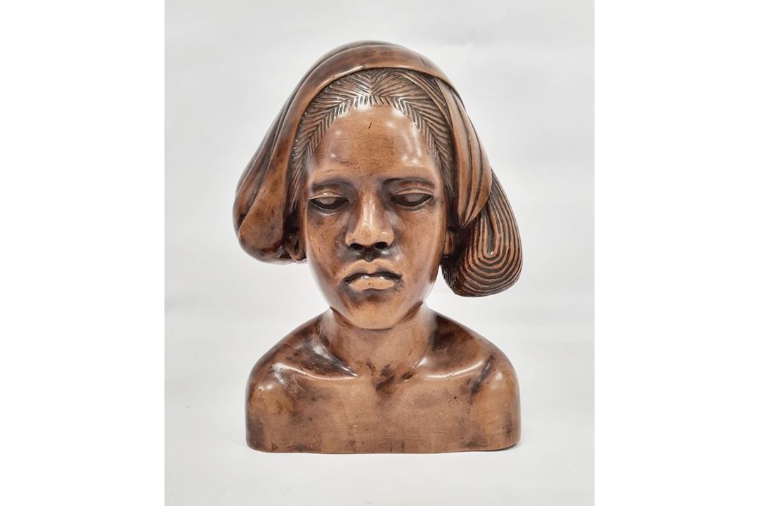 Assorted 20th century Eastern carved figures to include figure in hat carrying jug and basket, - Image 5 of 9