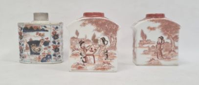 Porcelain tea caddy with floral decoration in Imari colours, 11cm high and a pair of porcelain tea