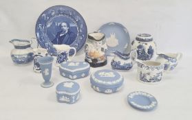 Victorian Staffordshire pottery Toby jug with seated figure, having willow pattern decorated coat,