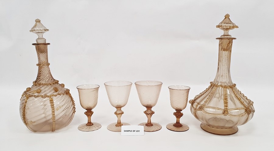 Suite of Venetian glass to include two decanters with gilt decoration, 18 larger wine glasses and 16