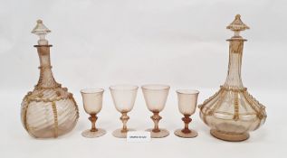 Suite of Venetian glass to include two decanters with gilt decoration, 18 larger wine glasses and 16
