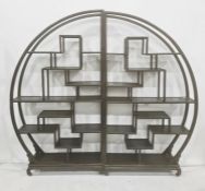 Pair of Chinese hardwood display shelves each of semi-circular design with numerous levels of