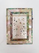 A 19th century mother of pearl and abalone inlaid card case, engraved decoration of peacocks amongst