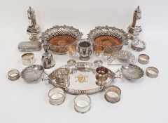 Pair plated sugar casters, pair silver plated wine bottle coasters with fruiting vine borders,