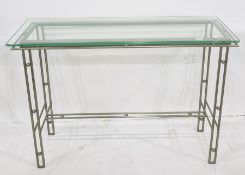 Modern glass and metal console table, the metal rod base with ball decoration and with rectangular