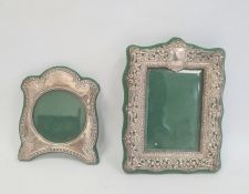 Edwardian silver mounted rectangular photograph frame, repousse and pierced scroll decoration,
