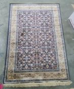 Blue ground Kashmiri allover design rug, 170 x 118cm