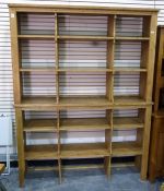 Two pine shelving units each with two open shelves and two upright divisions, 160cm wide x 104cm