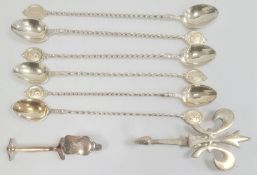 A set of six silver coloured metal cocktail spoons, numbered on finials 1 - 6, with spiral twist