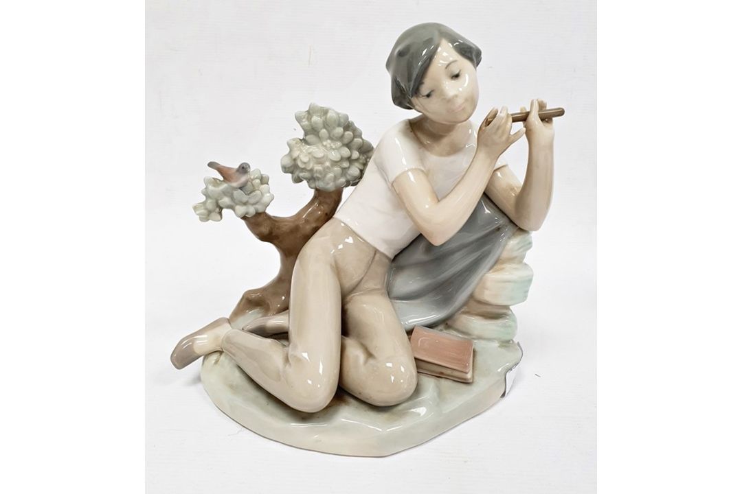 Lladro porcelain figure of boy with flute, 20cm high and another of girl seated with lamb (2) - Image 1 of 10