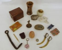 Two trays of assorted items to include table lighter, trinket box, carved egg, etc (2)