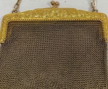 A 9ct gold chain purse, foliate decoration to clasp, 118g approx. Condition Reportsee image it is as