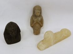 Three Egyptian carvings to include one possibly early stone carving and two later carvings (3)