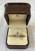 An 18ct white gold solitaire diamond ring, marquise cut, 12.5mm x 6.78mm x 4mm, total weight 2.05ct,
