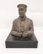 20th century resin bust of gentleman in cap holding binoculars, 27cm high