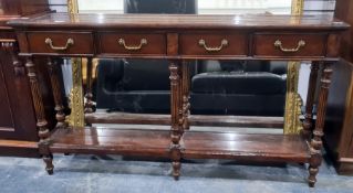 Modern hall table, the rectangular top with four drawers, raised on turned and reeded supports,