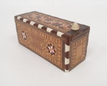 Anglo Indian inlaid boxed set of miniature dominoes with geometric inlaid decoration Condition