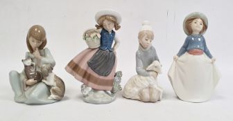 Lladro group of girl washing a dog, another model of rabbit, another cow, seated and swan with