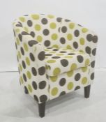 Modern green and black spotted tub chair