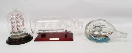 Glass ship in bottle, two further bottles with ships (3)