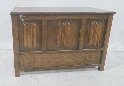 20th century oak blanket box, the rectangular top above the linenfold decorated front, single drawer