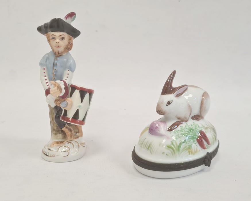 Limoges porcelain cachou box in the form of a rabbit with vegetable, 8cm high and continental