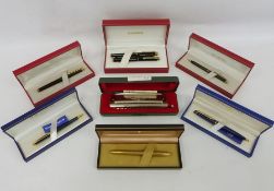 Assorted fountain pens including Sheaffer and Waterman and a Hohner Super Chromonica chromatic