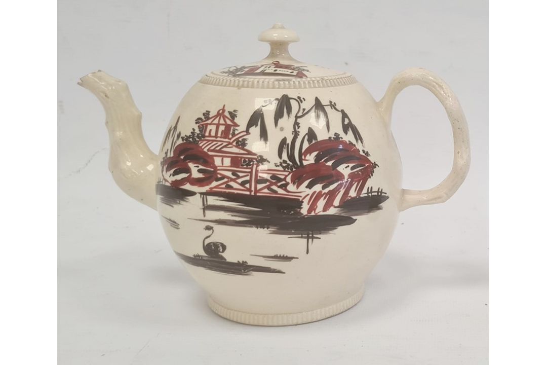 18th century English creamware teapot, the bulbous body with chinoiserie lakeside landscape in - Image 1 of 10