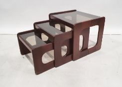 Mid-century nest of three tables with smoked glass tops