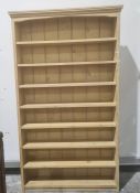 Cream painted open eight-shelf pine bookcase, 117cm x 204cm