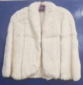 Cream fur evening cape with cream satin lining