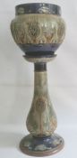 Royal Doulton stoneware jardiniere on stand, decorated with Art Nouveau flowers and scrolls, on a
