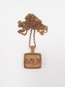 9ct gold pendant modelled as a half-ounce ingot on a gold coloured chain, total weight approx. 21g