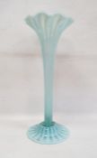 Large Victorian vaseline glass trumpet vase, having wavy everted rim, reeded column, on circular