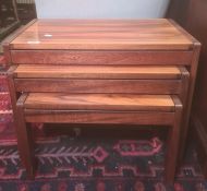 Mid-century nest of three probably Santos Palisander wood coffee tables