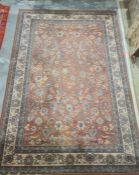 Modern peach ground rug, allover foliate decoration, cream ground border, 292cm x 200cm