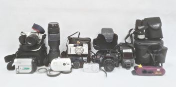 Quantity cameras, lenses, pair of binoculars to include Canon and MinoltaCondition ReportInformation