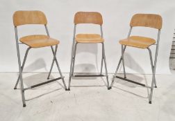 Three folding bar stools (3)