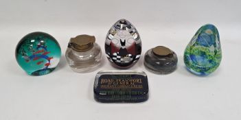 Two Victorian glass inkwells with brass hinged lids, a Caithness glass paperweight 'Ocean Shoal',