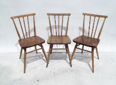 Set of three Ercol elm seated beech-framed stickback chairs (3)