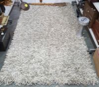 Modern cream ground rectangular rug, 255cm x 152cm