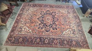 Eastern rug, pink ground with central foliate medallion, field foliately decorated, cream ground