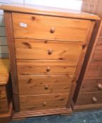 20th century narrow pine chest of five drawers, on ogee bracket feet, 64cm x 109.5cm Condition