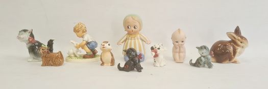 Goebel Hummel club figure of a boy playing with a rabbit, printed marks, 11cm high, together with