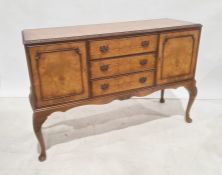 20th century walnut sideboard, the rectangular top with moulded and carved edge