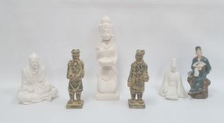 Group of Asian stone, plaster and porcelain figures, 20th century, including an Indonesian figure of