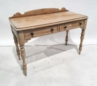 Late 19th/early 20th century pine washstand with galleried back, rectangular top, rounded front