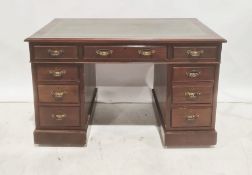20th century mahogany pedestal desk with green leather inset top, nine assorted drawers, on plinth
